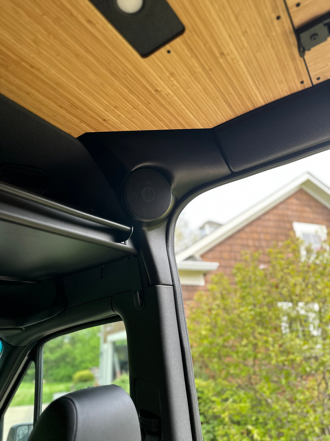 Audio trim kit in passenger overhead threshold