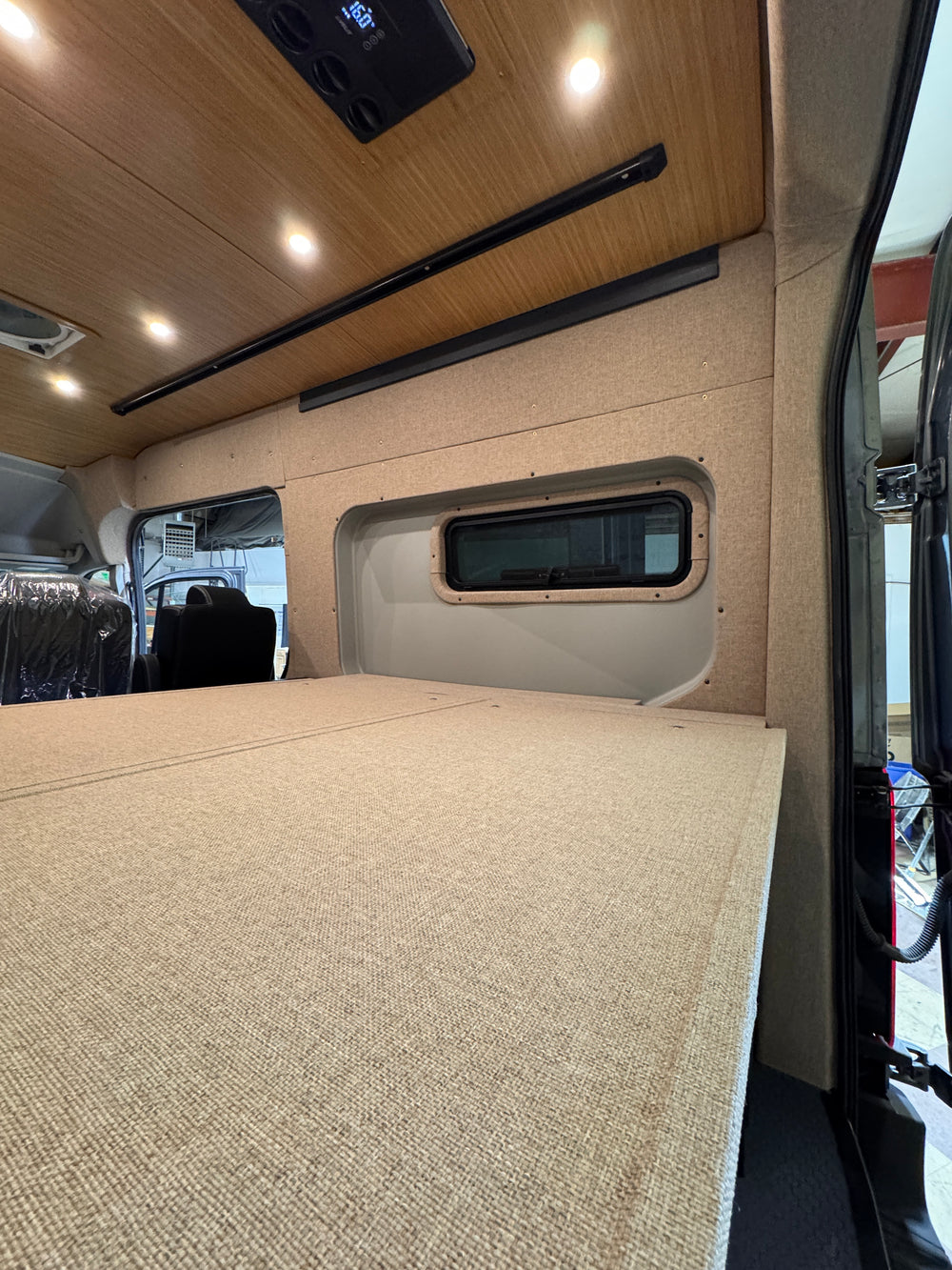 Ford Transit Innie Pocket Sleeper Half-Slider Window Beauty Ring installed