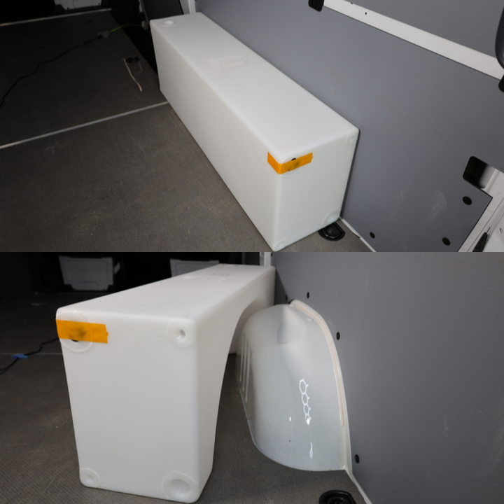 wheel well water tank centered